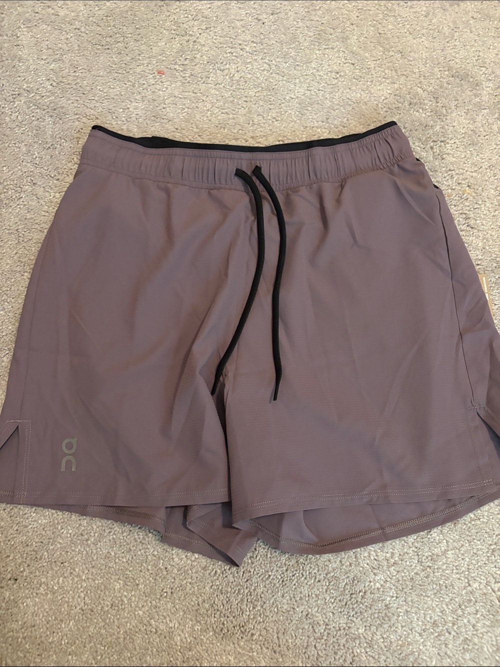 On Running women’s Dusty Purple Athletic Shorts with Black Drawstring